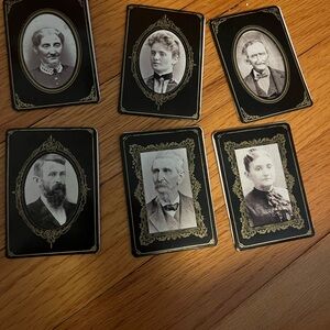 6 mini reproduced sepia portrait photos in brown and gold paper frames